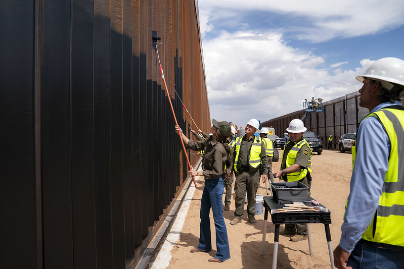Department of Homeland Security (DHS) Secretary Kristi Noem speaks during a press conference at the border wall in Santa Teresa, New Mexico, August 19, 2025. (DHS photo by Tia Dufour)


