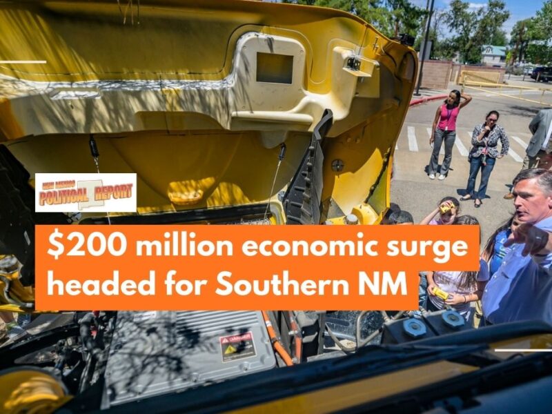 New Mexico Senator Martin Heinrich, far right, talks to kids at Los Ranchos Elementary during press conference where the Senator was joined by APS Superintendent Gabriella Duran-Blakey and members of Mom’s Clean Airforce— an organization dedicated to protecting children from air pollution and climate change where they announced a $7 million Infrastructure Law funding to help APS purchase 20 new electric school buses. (Roberto E. Rosales)