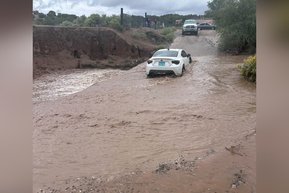 Lt. Gov. Howie Morales, filling in for Gov. Michelle Lujan Grisham, who is out of state, signed five executive orders Wednesday declaring a state of emergency due to flooding across New Mexico. (Santa Fe Police Department.)