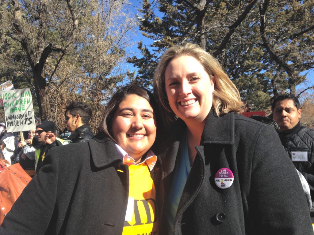 Amber Royster (right), director of Equality New Mexico, appeared at the rally with the group's Southern New Mexico Field Coordinator, Myra Llerenas (left). Said Royster, "We've had a law that's worked for ten years, so why the heck are we wasting a bunch of time, energy and money to repeal something that already works and is already being modeled by other states at this point? We already know as LGBT people that separate is not equal, so this idea of the two-tiered driver's license flies in the face of what equality actually is."