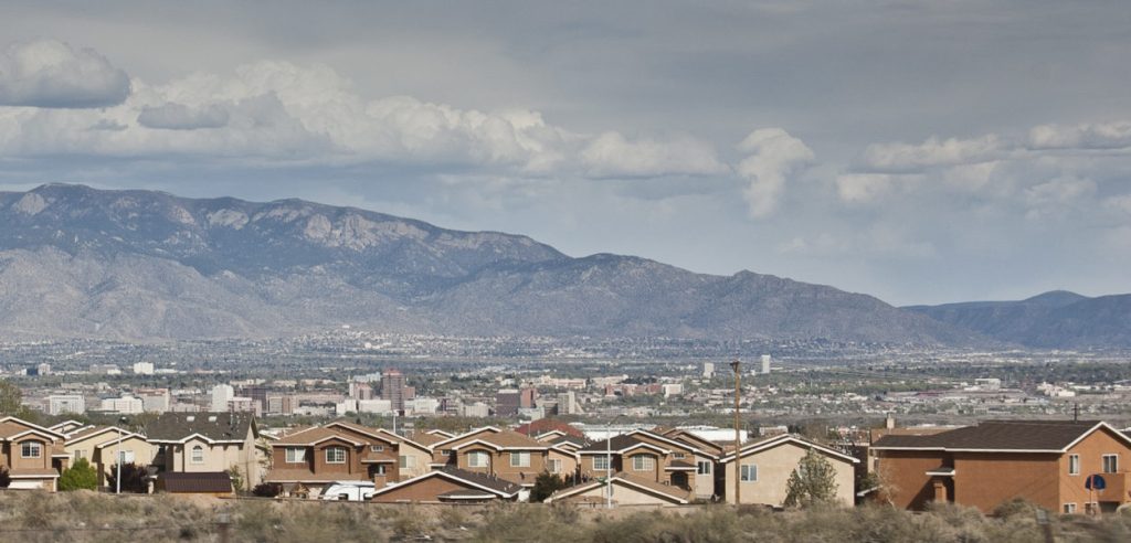 Albuquerque’s iconic downtown skyline looks drastic different from certain Westside vantage points marked by new development. Photo by Margaret Wright