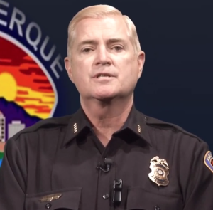 Screenshot of a video of Albuquerque Police Chief Gorden Eden announcing investigation into misconduct by APD officers.