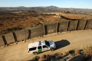 A US Border Patrol agent patrols the US/Mexico border