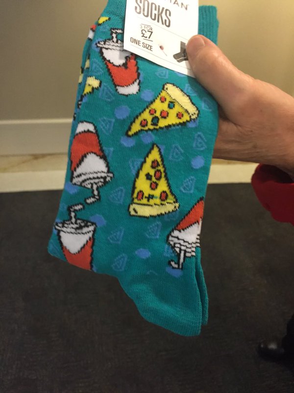 Senators wear pizza and coke socks to State of the State