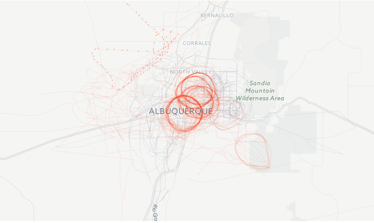 Flight paths of FBI planes that flew over the Albuquerque metro area through December, 2015. The darker red areas indicate more flights. Screenshot of Buzzfeed map. 