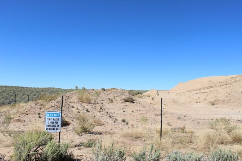 A warning sign near a fracking well in the Greater Chaco area.