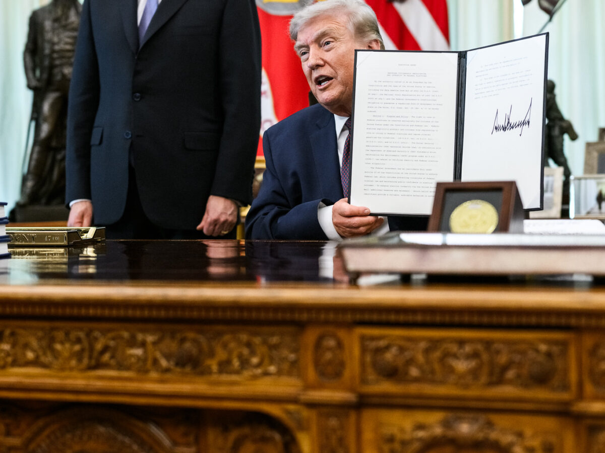 President Donald J. Trump signs an Executive Order limiting mail-in voting, Tuesday, March 31, 2026, in the Oval Office. (Official White House Photo by Joyce N. Boghosian)