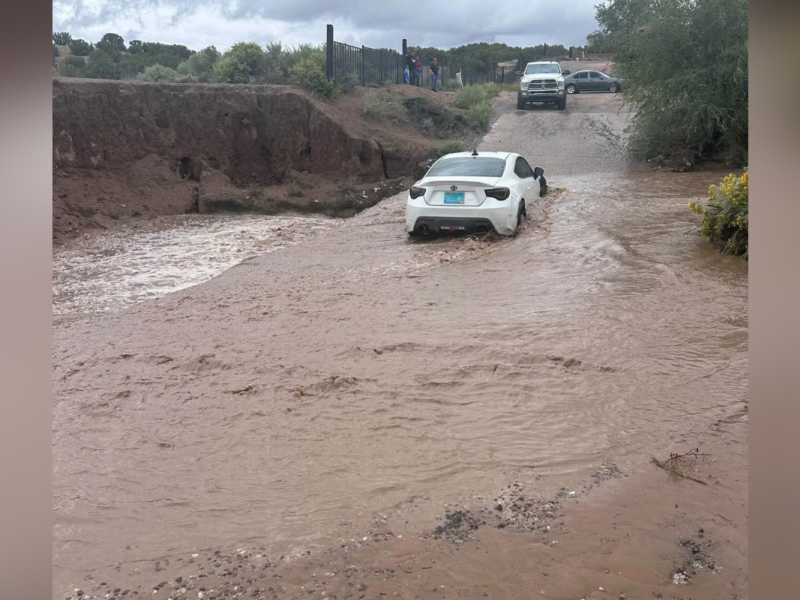 Lt. Gov. Howie Morales, filling in for Gov. Michelle Lujan Grisham, who is out of state, signed five executive orders Wednesday declaring a state of emergency due to flooding across New Mexico. (Santa Fe Police Department.)