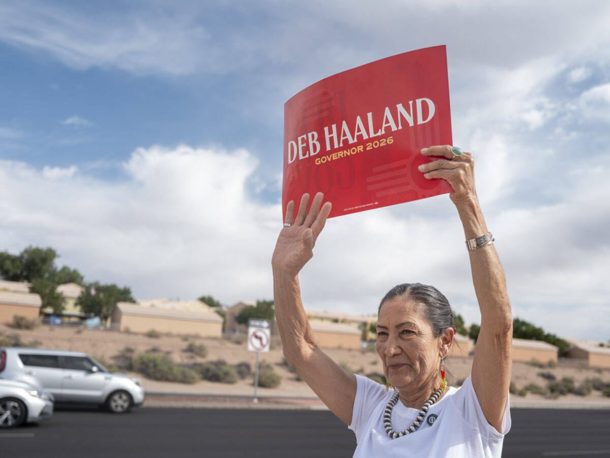 Democratic gubernatorial candidate Deb Haaland campaigns along Coors Blvd in Albuquerque’s westside Tuesday morning near the Andalucia Shopping Center. Photo by Roberto E. Rosales for the Paper